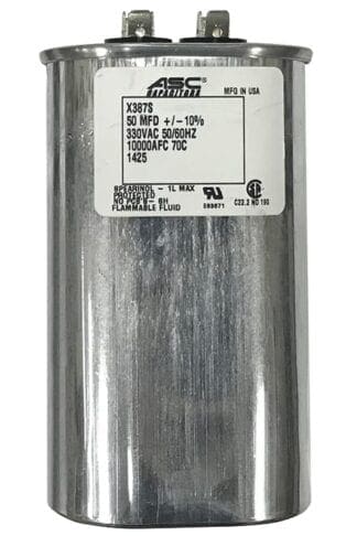 Silver capacitor with label and specifications.