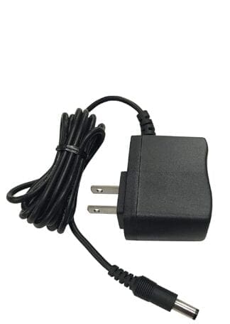 Black power adapter with cord and plug.