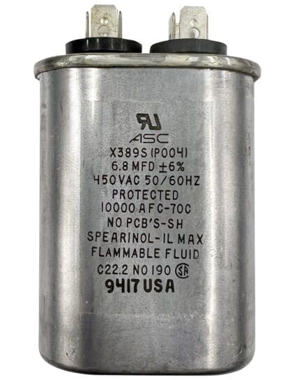 Silver capacitor with black label and text.