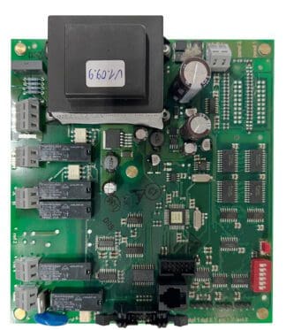 Green circuit board with electronic components.